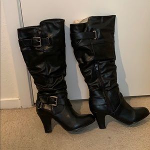 Knee high heeled boots